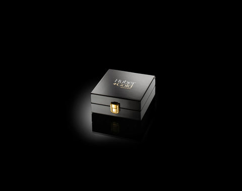 23K und 24K Gold Zuckerwürfel in edler Klavierlackbox