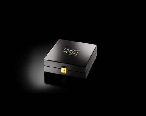 23K und 24K Gold Zuckerwürfel in edler Klavierlackbox